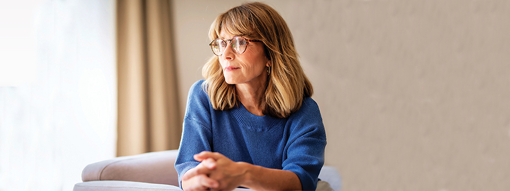 Picture of a woman sitting in a room